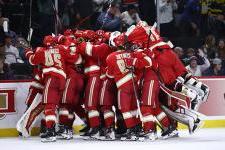 DU hockey celebrates its semifinal victory against Boston University.