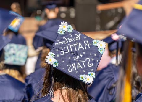  A graduation cap reads, "you're gonna rattle the stars" 